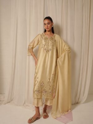 MAYSAA -- Daisy 07A luminous champagne silhouette adorned with intricate hand embellishments, de (1).jpg Caramel Rose (SILK) 3-Piece Handworked Ensemble | Stitched & Unstitched